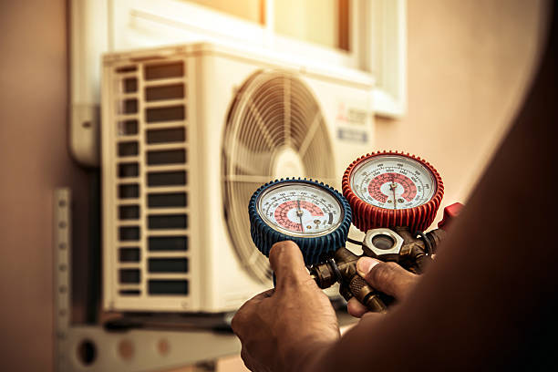 Professional Hvac Installation technician working in Hensley, AR